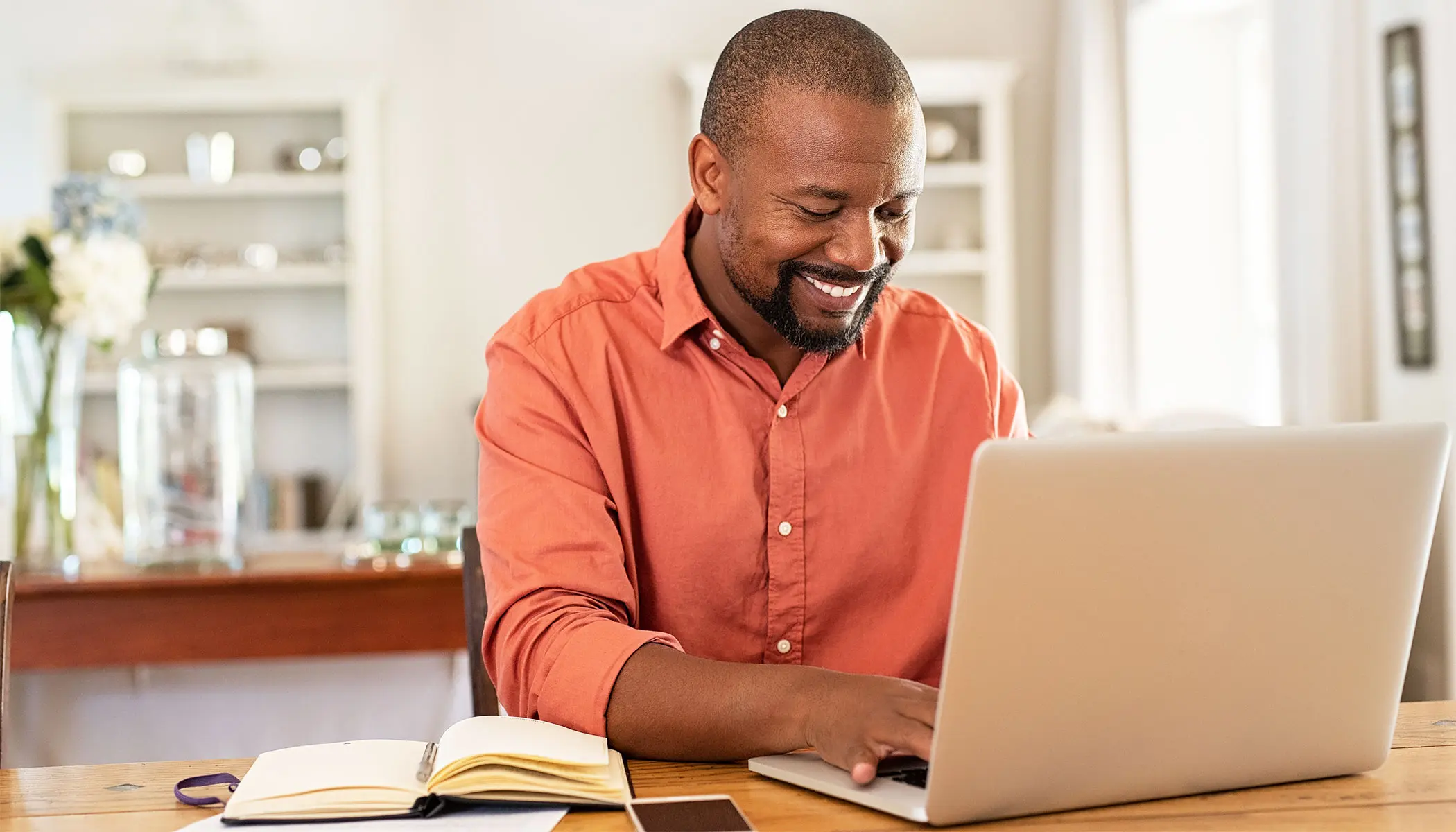 Man working at desk in home office