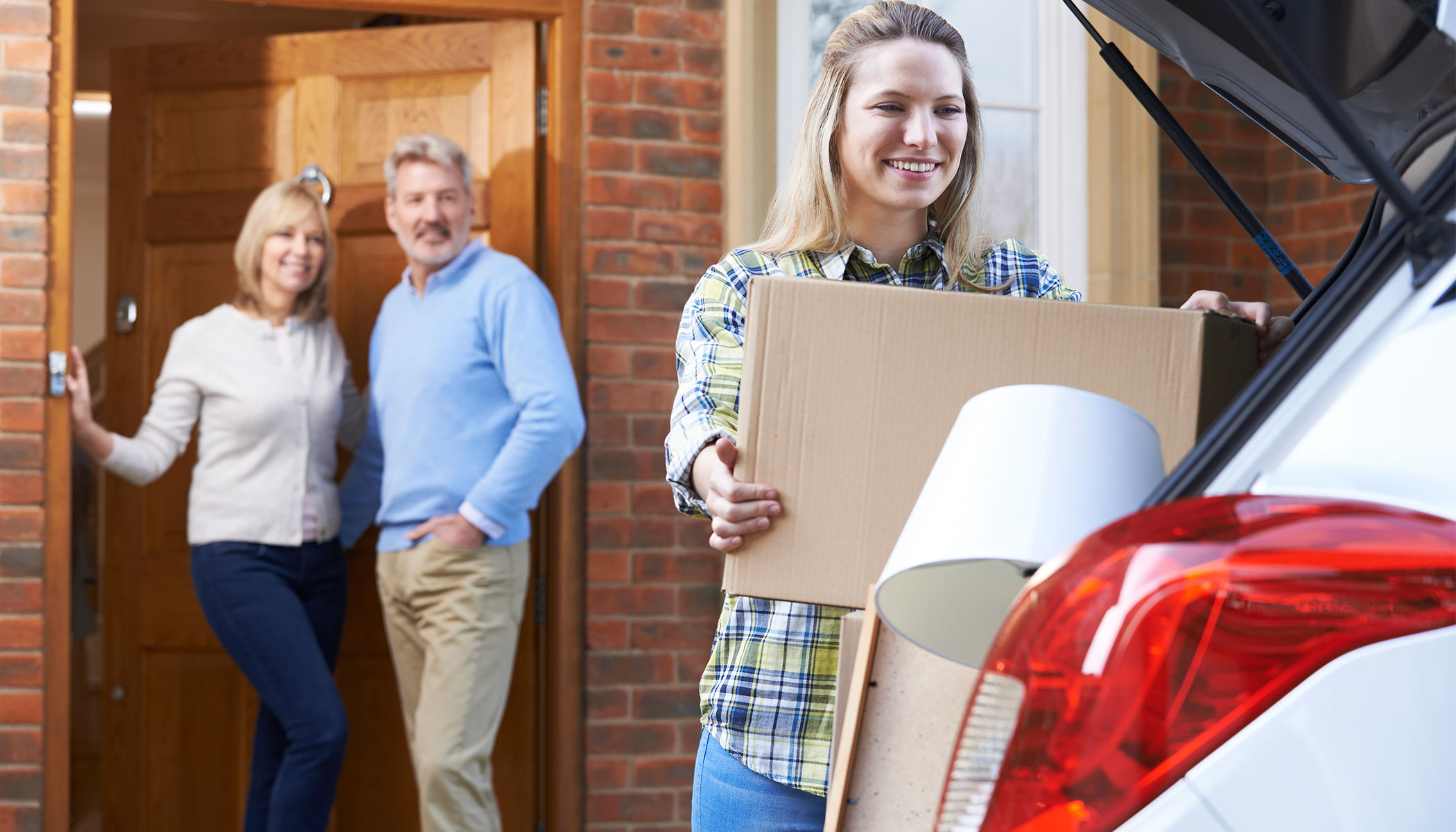 Parents watch child pack to leave for college