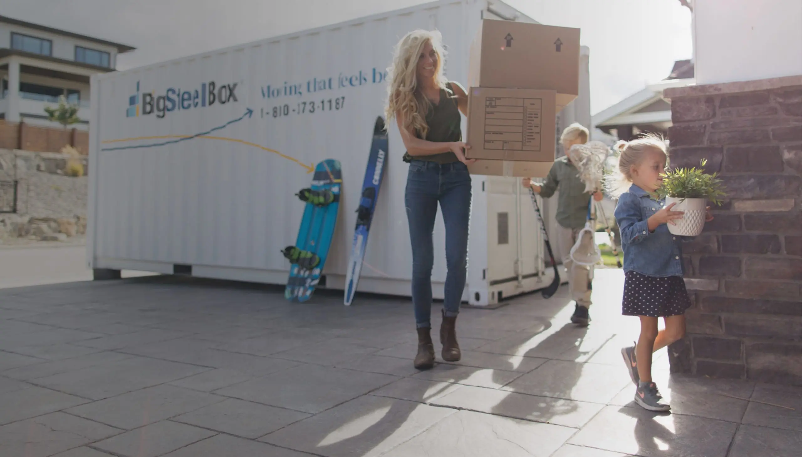 Family moving Boxes from a BigSteelBox