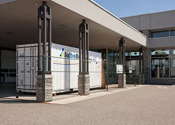 BigSteelBox portable storage container outside office building.